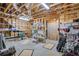 Unfinished basement space with exposed wood framing, shelving, and concrete flooring perfect for customization at 7015 Polo Dr, Cumming, GA 30040