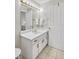 Bathroom featuring sink with drawers, tile flooring and mirror at 7015 Polo Dr, Cumming, GA 30040