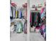 Walk-in closet features organization system, providing ample storage space at 7015 Polo Dr, Cumming, GA 30040