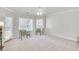 Open living space with natural light and stylish furniture at 7015 Polo Dr, Cumming, GA 30040