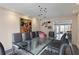 Bright dining area featuring a glass dining table with room for ten at 870 Waddington Ct, Atlanta, GA 30350