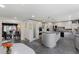 Modern kitchen connected to a dining area at 870 Waddington Ct, Atlanta, GA 30350