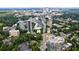 Stunning aerial view of city skyline with lush greenery and modern high-rise buildings at 91 Rumson Ne Rd # C34, Atlanta, GA 30305