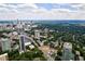 Scenic aerial view capturing the cityscape skyline, blending urban development with lush greenery and clear skies at 91 Rumson Ne Rd # C34, Atlanta, GA 30305