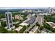 Stunning aerial view showcasing the cityscape with high-rise buildings amid lush trees and a beautiful skyline at 91 Rumson Ne Rd # C34, Atlanta, GA 30305