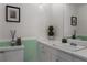 Bright bathroom with a well-lit mirror, white counter tops, and a sleek sink at 91 Rumson Ne Rd # C34, Atlanta, GA 30305