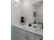 Bright bathroom with a well-lit mirror, white counter tops, and a sleek sink at 91 Rumson Ne Rd # C34, Atlanta, GA 30305