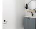 Bathroom features blue vanity and updated fixtures at 994 Byron Sw Dr, Atlanta, GA 30310