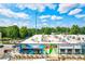 A high-angle shot of a rooftop featuring Gusto and Costa Coffee establishments with surrounding greenery at 994 Byron Sw Dr, Atlanta, GA 30310