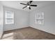 Bedroom with a ceiling fan and carpet flooring at 2880 Hall Se Dr, Smyrna, GA 30082