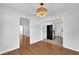 Dining room featuring hardwood floors and an open layout into the kitchen at 2880 Hall Se Dr, Smyrna, GA 30082