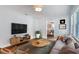 Cozy living room decorated with stylish furniture, complementing the hardwood floors and bright interior at 2880 Hall Se Dr, Smyrna, GA 30082