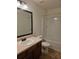 Standard bathroom featuring a vanity, mirror, toilet, and bathtub-shower combination at 312 Overview Dr, Canton, GA 30114