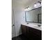 Bathroom vanity features double sinks, a large mirror and updated fixtures at 312 Overview Dr, Canton, GA 30114