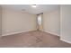 Bedroom with neutral walls, carpet and curtains on the window at 312 Overview Dr, Canton, GA 30114