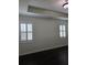 The bedroom features two windows with classic shutters, providing natural light and privacy at 312 Overview Dr, Canton, GA 30114
