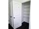 Linen closet has a paneled door and built-in wire shelving for storing towels at 312 Overview Dr, Canton, GA 30114