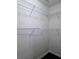 Walk-in closet features built-in wire shelving to help keep you organized at 312 Overview Dr, Canton, GA 30114