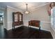 Elegant dining room features dark wood floors and classic furniture at 312 Overview Dr, Canton, GA 30114