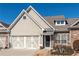 Charming home with a two-car garage, stone accents, and a welcoming front door at 312 Overview Dr, Canton, GA 30114