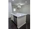 This kitchen island features a sink, dishwasher, and additional storage at 312 Overview Dr, Canton, GA 30114