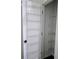 Organized pantry with door-mounted and wall-mounted wire shelving, maximizing storage in a compact space at 312 Overview Dr, Canton, GA 30114