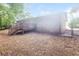 Home's backyard features a deck and exterior at 5411 Louis Xiv Ln, Atlanta, GA 30349