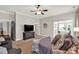 Comfortable bedroom featuring a ceiling fan and a view to the office at 201 Beacon Cv, Canton, GA 30114