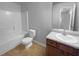 Bathroom featuring a shower-tub combo and vanity with tiled floors at 2382 Capella Sw Cir, Atlanta, GA 30331