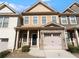 Charming two-story home with brick facade, attached garage, and well-manicured landscaping at 2382 Capella Sw Cir, Atlanta, GA 30331