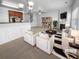 Bright living room with neutral walls, a fireplace and dark accents at 2382 Capella Sw Cir, Atlanta, GA 30331