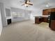 Spacious living room with fireplace opens to the modern kitchen at 2382 Capella Sw Cir, Atlanta, GA 30331