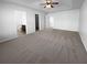 Spacious main bedroom featuring neutral walls and attached bathroom and closet at 2382 Capella Sw Cir, Atlanta, GA 30331