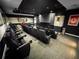 Private home theater with tiered seating for an immersive cinematic experience at 3445 Stratford Ne Rd # 2402, Atlanta, GA 30326