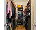 Organized walk-in closet provides ample storage with custom shelving and hanging space at 3445 Stratford Ne Rd # 2402, Atlanta, GA 30326