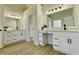 Bright bathroom with double vanities, mirrors, and modern fixtures at 3850 Westwick Nw Way, Kennesaw, GA 30152