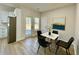 Bright dining area with backyard access and white cabinets at 3850 Westwick Nw Way, Kennesaw, GA 30152