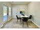 Bright dining area with backyard access at 3850 Westwick Nw Way, Kennesaw, GA 30152