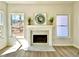 Bright living space featuring a modern fireplace and natural light at 3850 Westwick Nw Way, Kennesaw, GA 30152