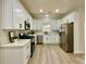 Beautiful kitchen with stainless appliances and white countertops at 3850 Westwick Nw Way, Kennesaw, GA 30152