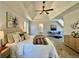 Large main bedroom with a tray ceiling and hardwood floors at 3850 Westwick Nw Way, Kennesaw, GA 30152