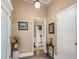 Entryway with wood-look floor and neutral wall paint color at 3890 Irwin Bridge Nw Rd, Conyers, GA 30012