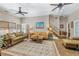 Sunlit living room featuring hardwood floors, and comfortable seating arrangement at 3890 Irwin Bridge Nw Rd, Conyers, GA 30012