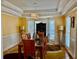 Formal dining room features a tray ceiling, chandelier, and bay window at 1230 Mars Hill Nw Rd, Acworth, GA 30101