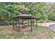 Charming gazebo with a fire pit, perfect for cozy evenings in the backyard at 1230 Mars Hill Nw Rd, Acworth, GA 30101