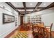 Game room featuring tables with chessboards, custom shelving, and a coffered ceiling at 1717 N Decatur Ne Rd # 322, Atlanta, GA 30307