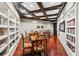 Well lit game room with hardwood floors, a coffered ceiling, and custom shelving at 1717 N Decatur Ne Rd # 322, Atlanta, GA 30307