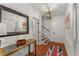 Welcoming foyer with a console table, hardwood floors, and a staircase, providing a warm and stylish entrance at 2384 Defoors Ferry Nw Rd, Atlanta, GA 30318