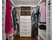 The walk-in closet is fully organized with shelving and built-in storage at 2384 Defoors Ferry Nw Rd, Atlanta, GA 30318