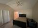 Bright bedroom with vaulted ceilings and a ceiling fan at 6231 Hickory Lane Cir, Union City, GA 30291